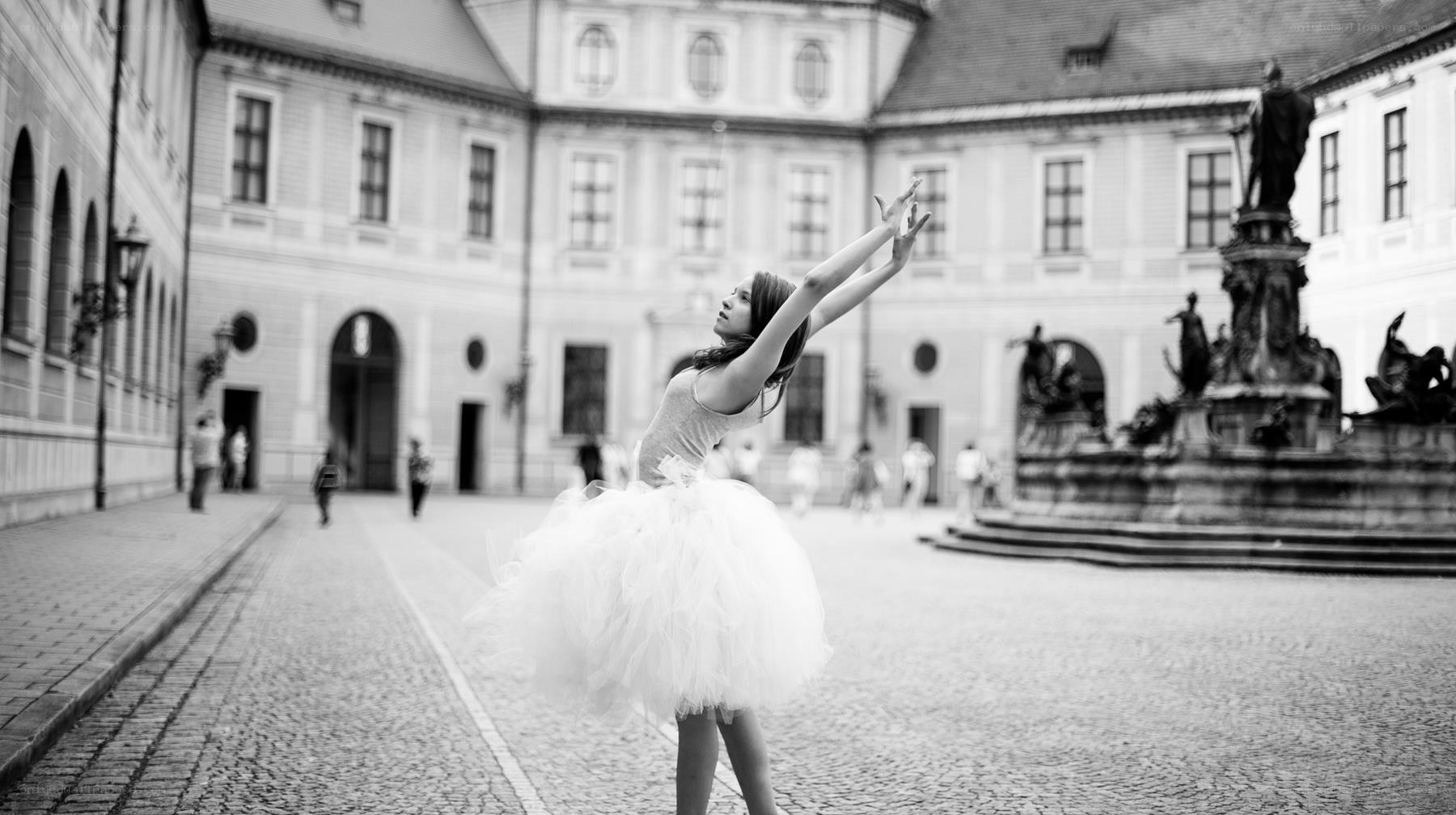 Ballerina in courtyard