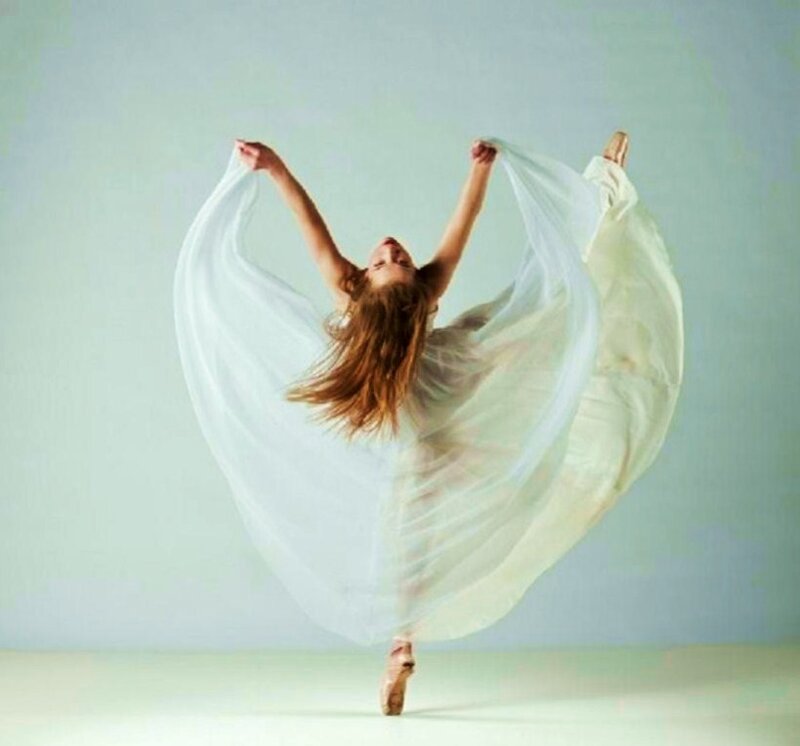 Ballerina in flowing white dress