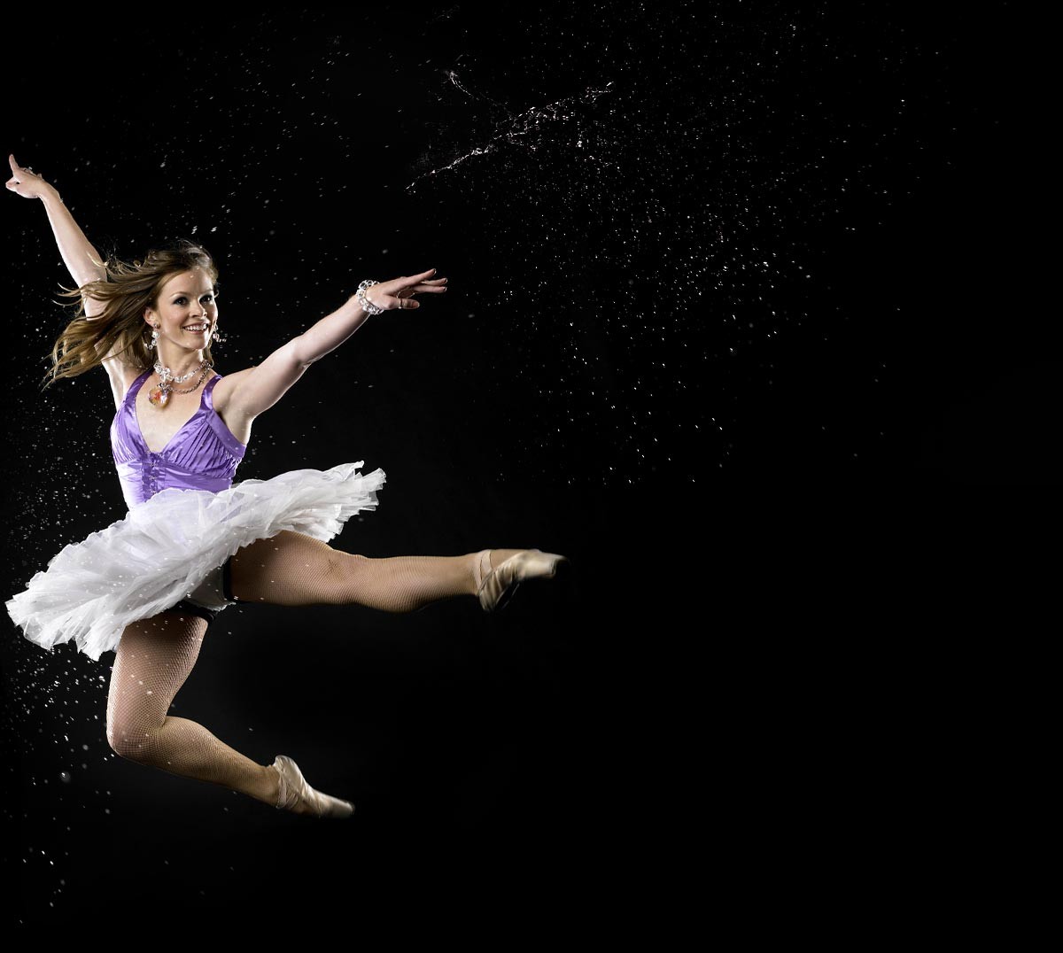 Ballerina in mid-jump