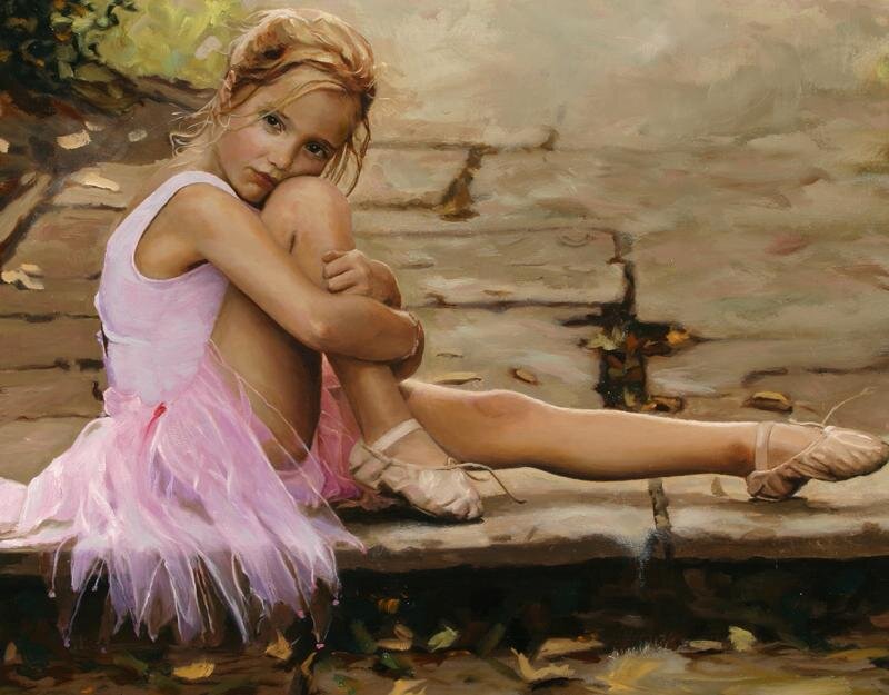 Ballerina sitting on a bench