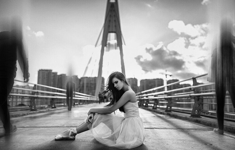 Ballerina Sitting on Bridge