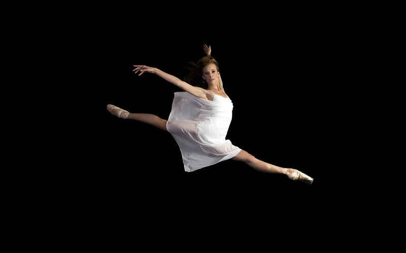 Ballet Dancer in Mid-air — White, Dramatic