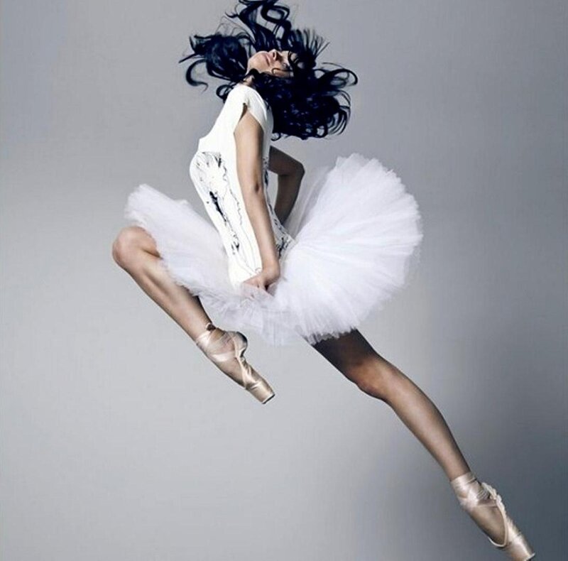 Ballet Dancer in Mid-air — White, Dynamic