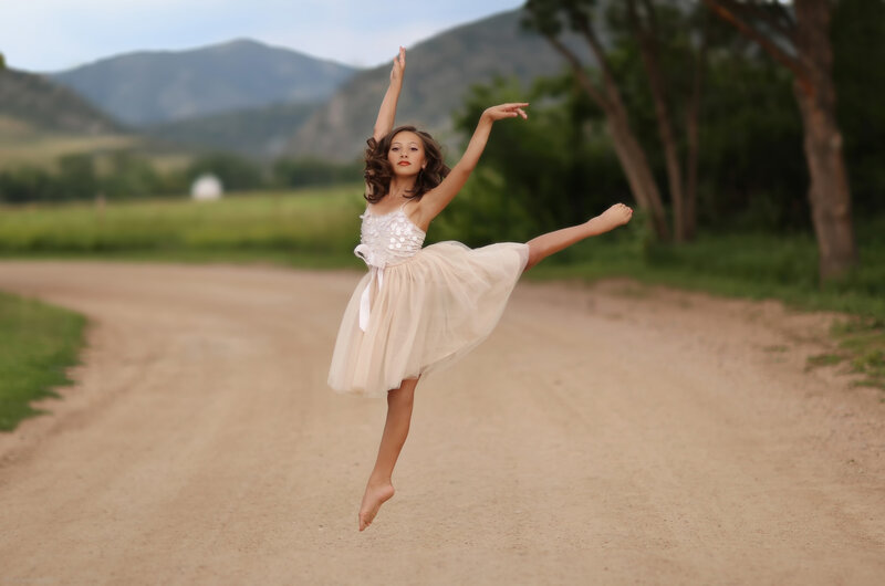 Ballet Dancer in Mid-jump — Beige