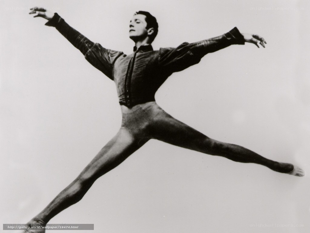 Ballet dancer in mid-leap