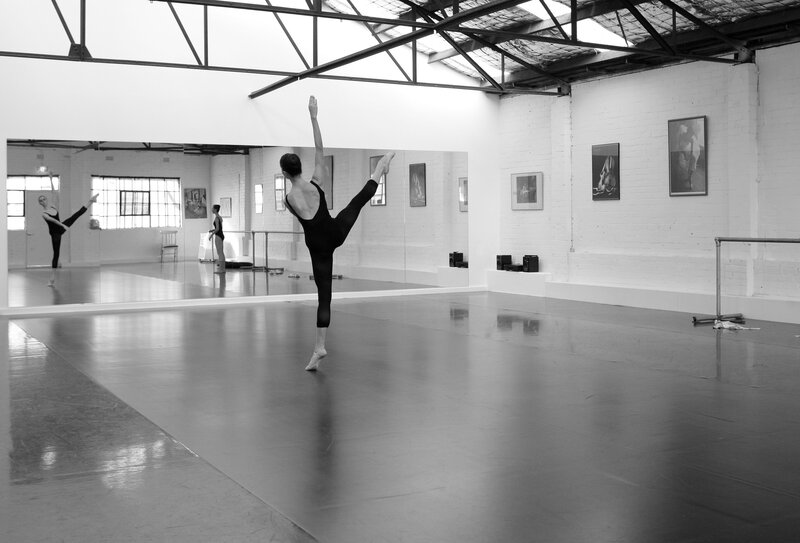 Ballet Dancer in Studio — Black, Focused, Photograph