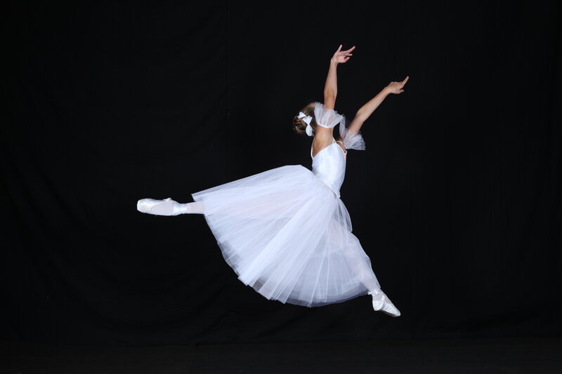 Ballet Dancer in White Tutu — Dramatic, Photograph, Pointe Shoes, Black Background