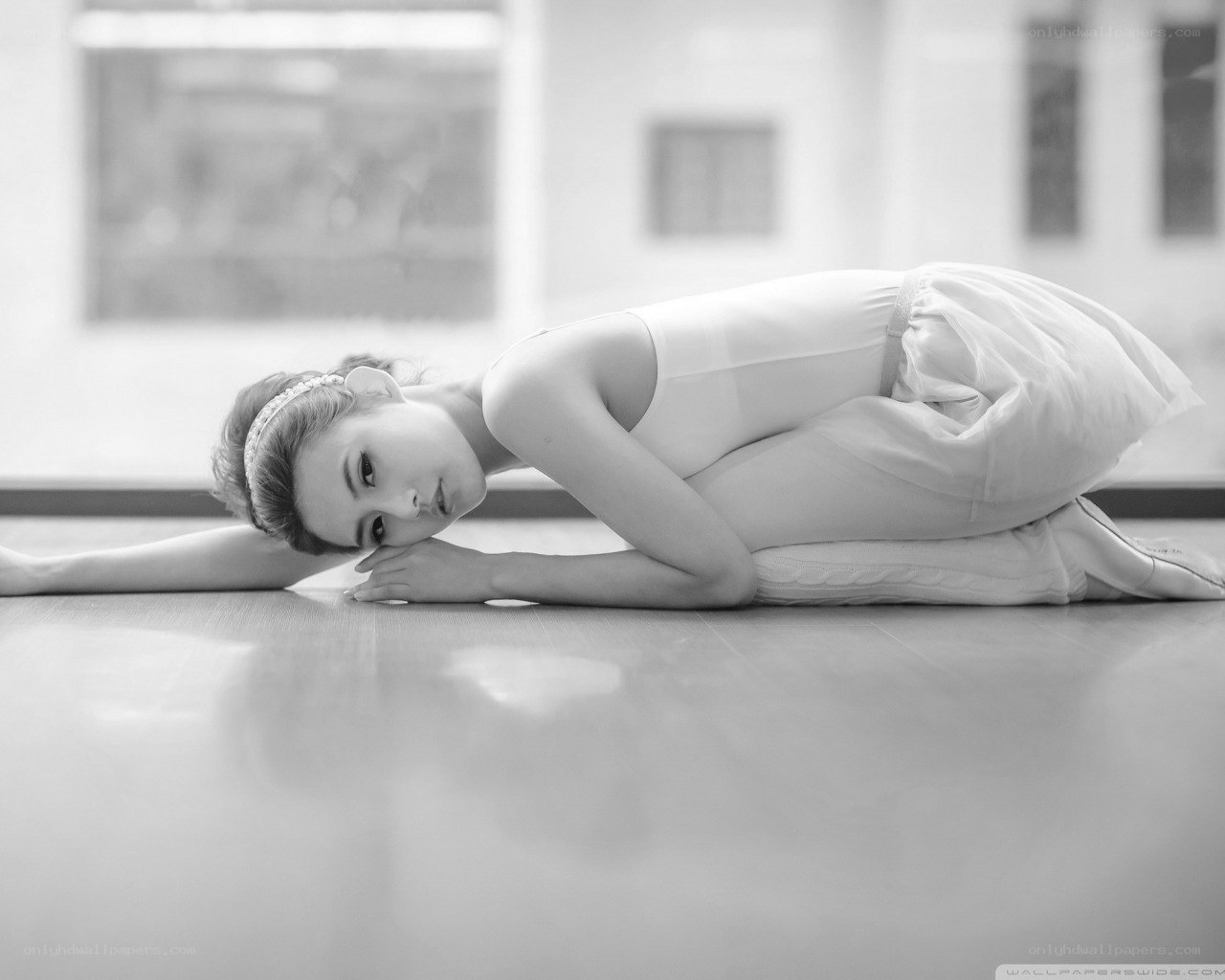 ballet dancer resting on floor
