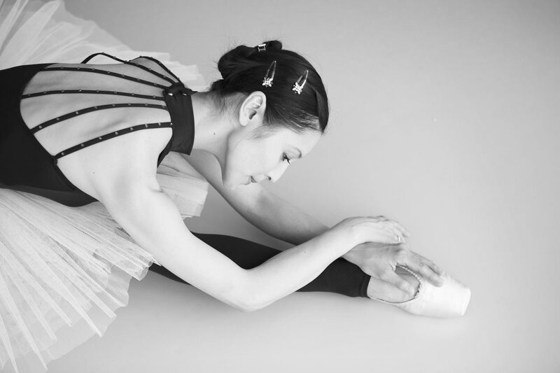 Ballet Dancer Stretching — Black, Calm, Photograph