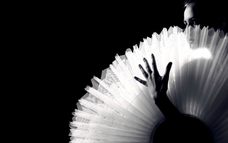 ballet dancer with white fan