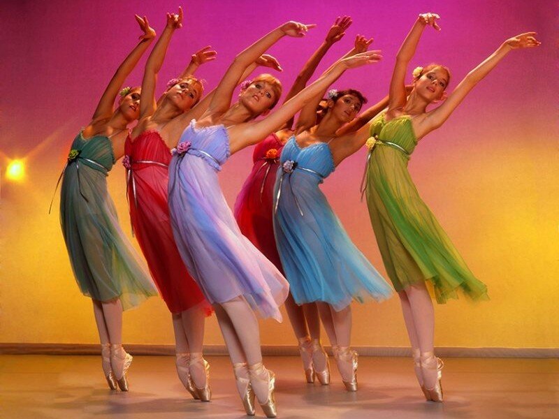 ballet dancers in colorful dresses
