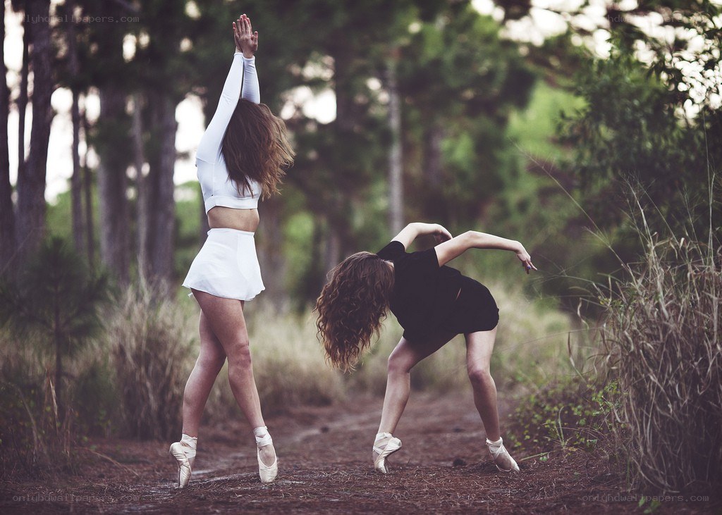 Ballet dancers in forest