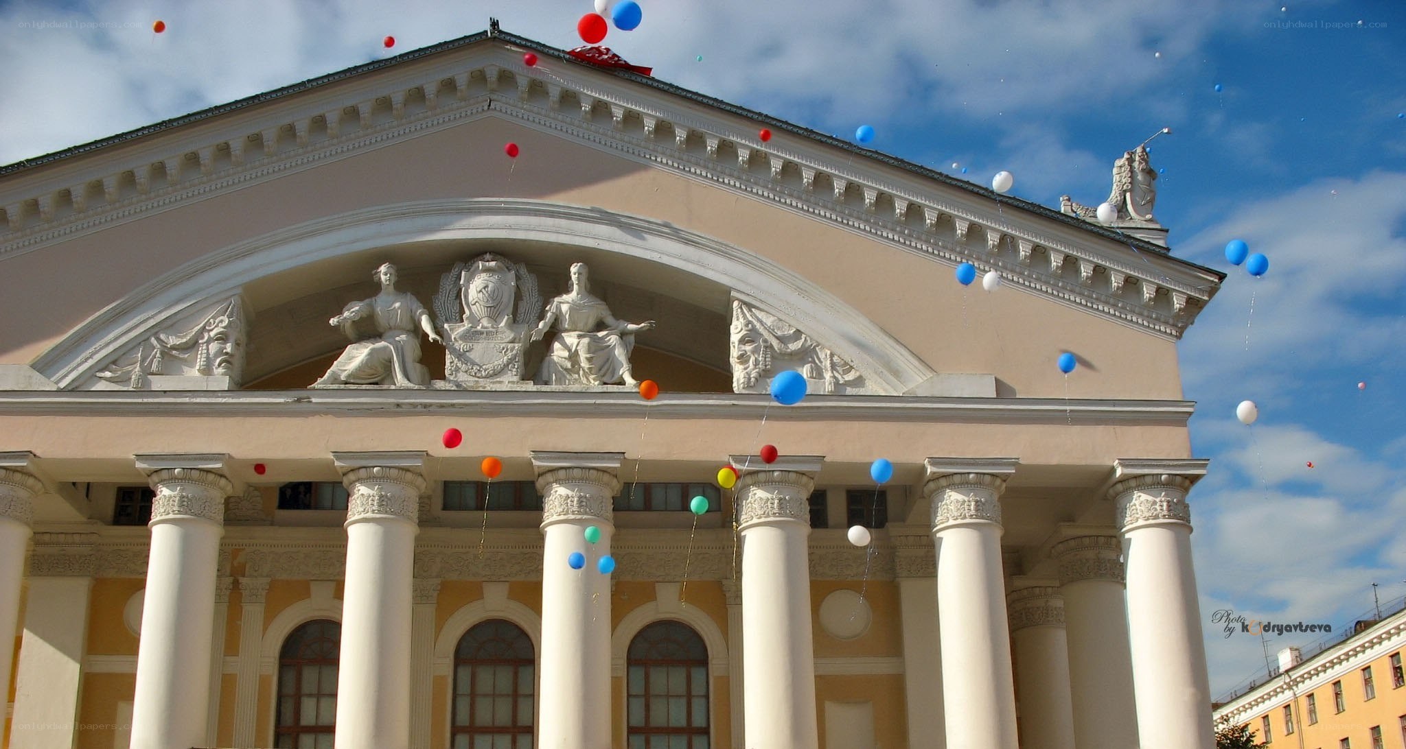balloons at a classical building