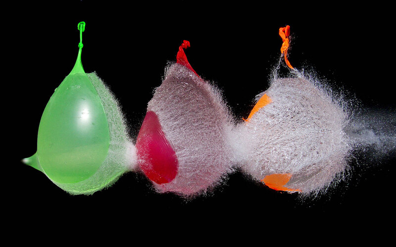 Balloons bursting in sequence