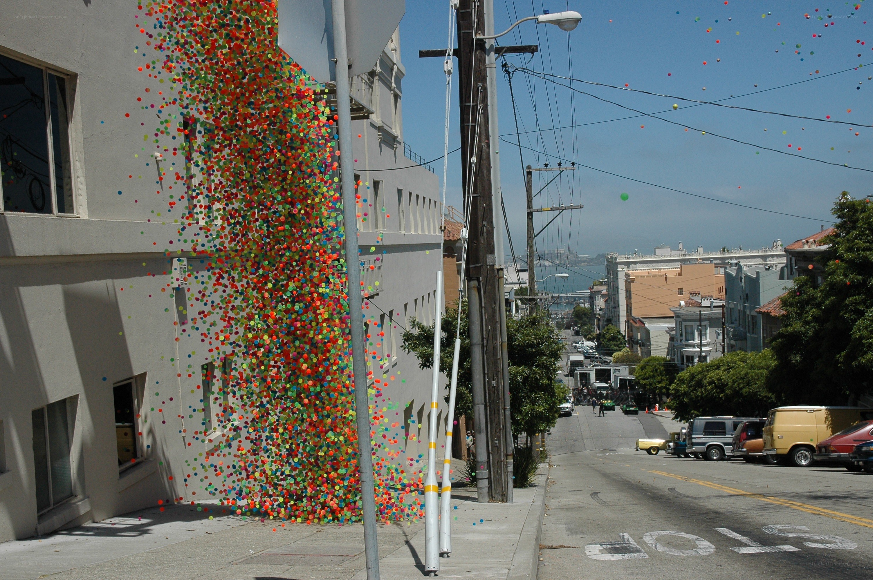 Balloons falling from building