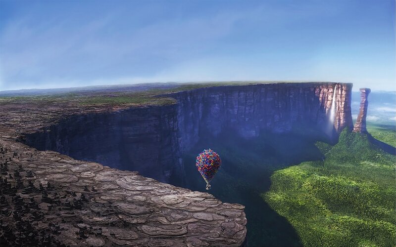 balloons flying over canyon