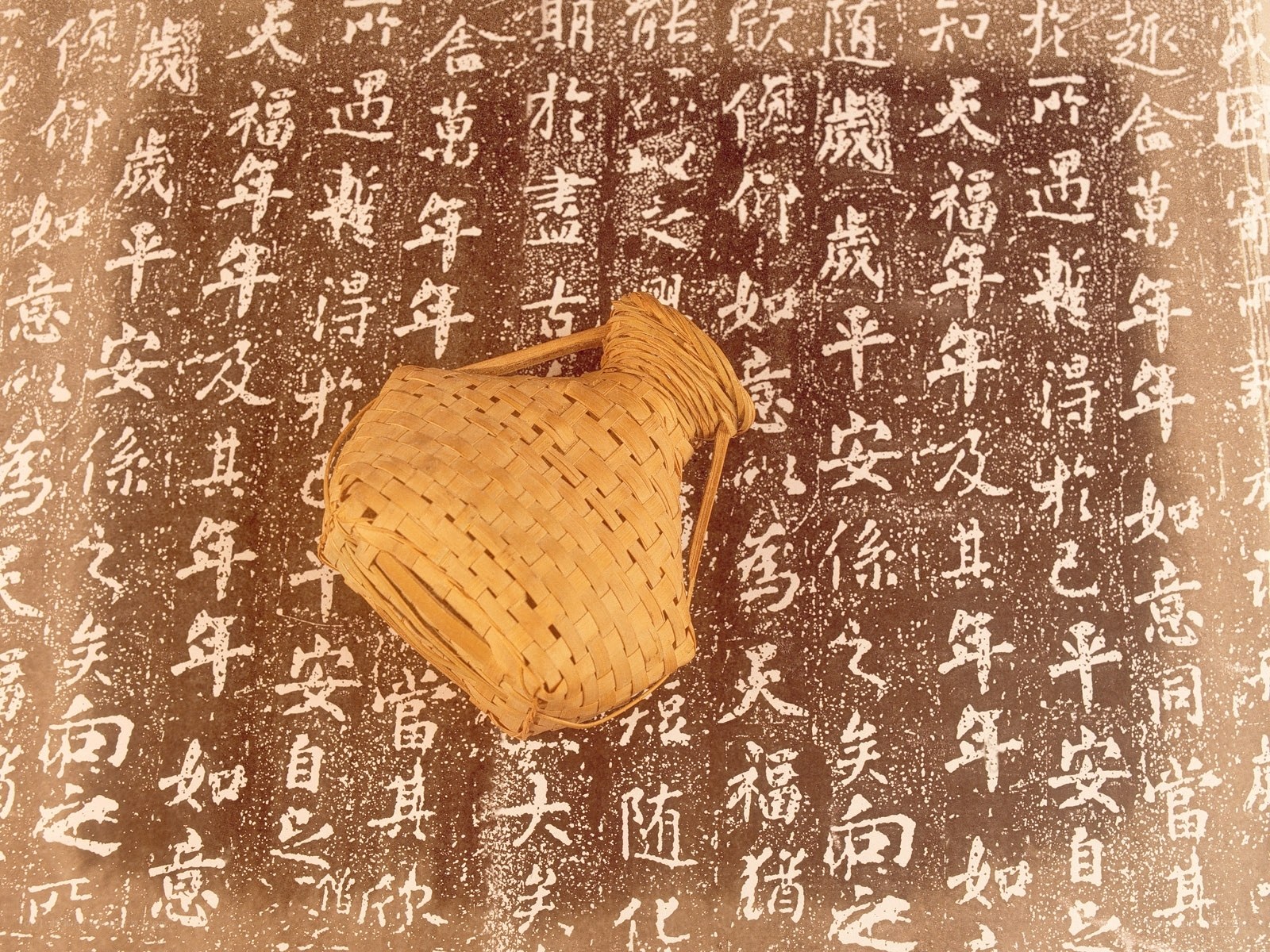 Bamboo basket on calligraphy