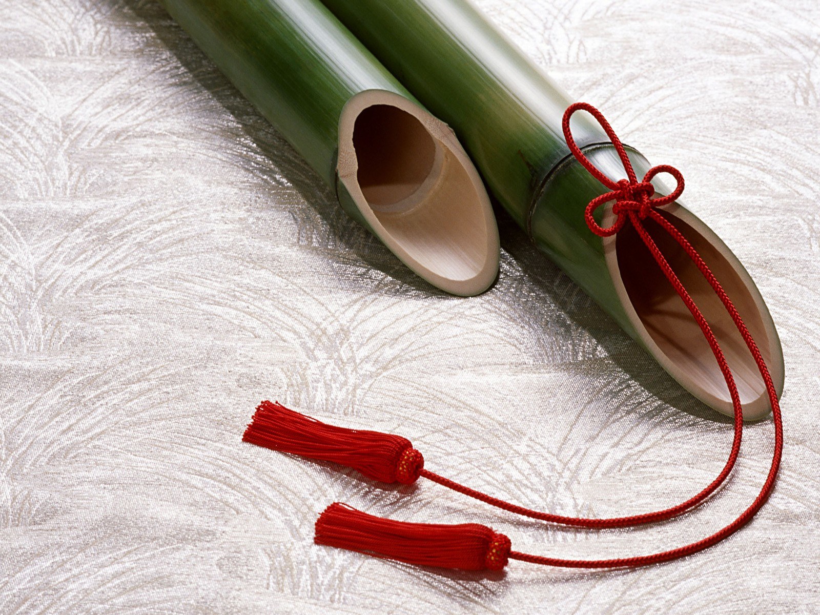 Bamboo flutes with red tassels