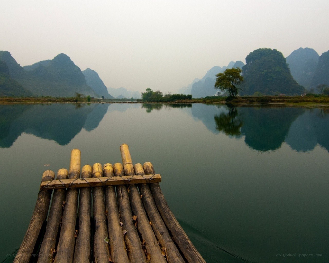 Bamboo raft on a calm river