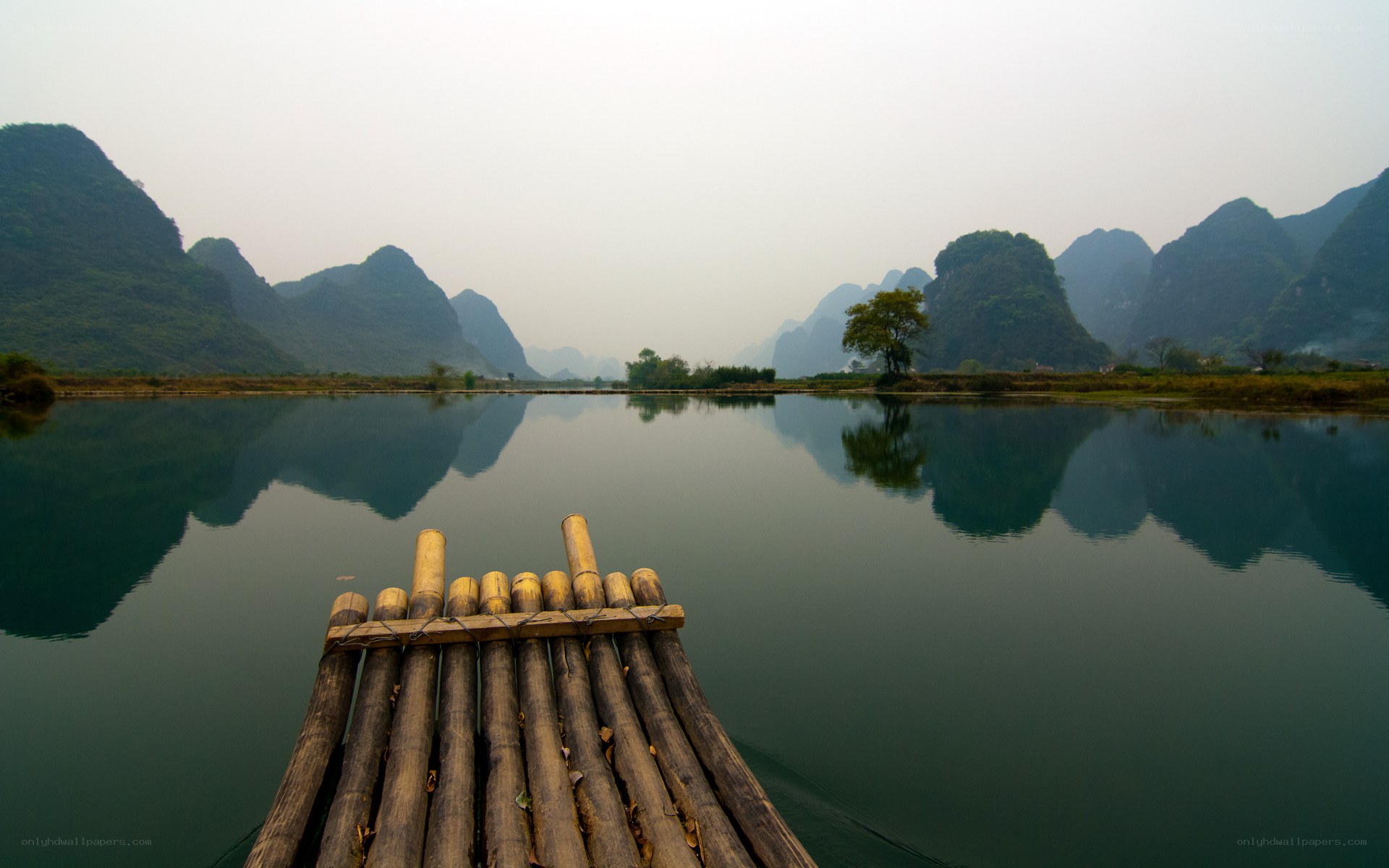Bamboo raft on a calm river