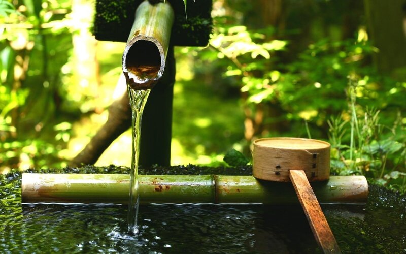 Bamboo water fountain in garden
