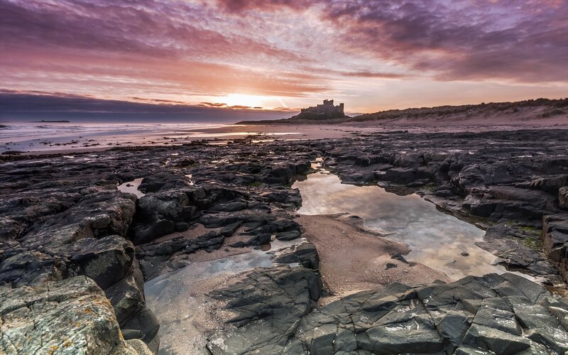 Bamburgh Castle at Sunset — Purple, Dramatic, Photograph