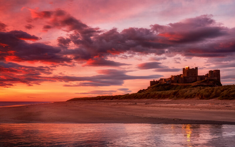 Bamburgh Castle at Sunset — Red, Dramatic