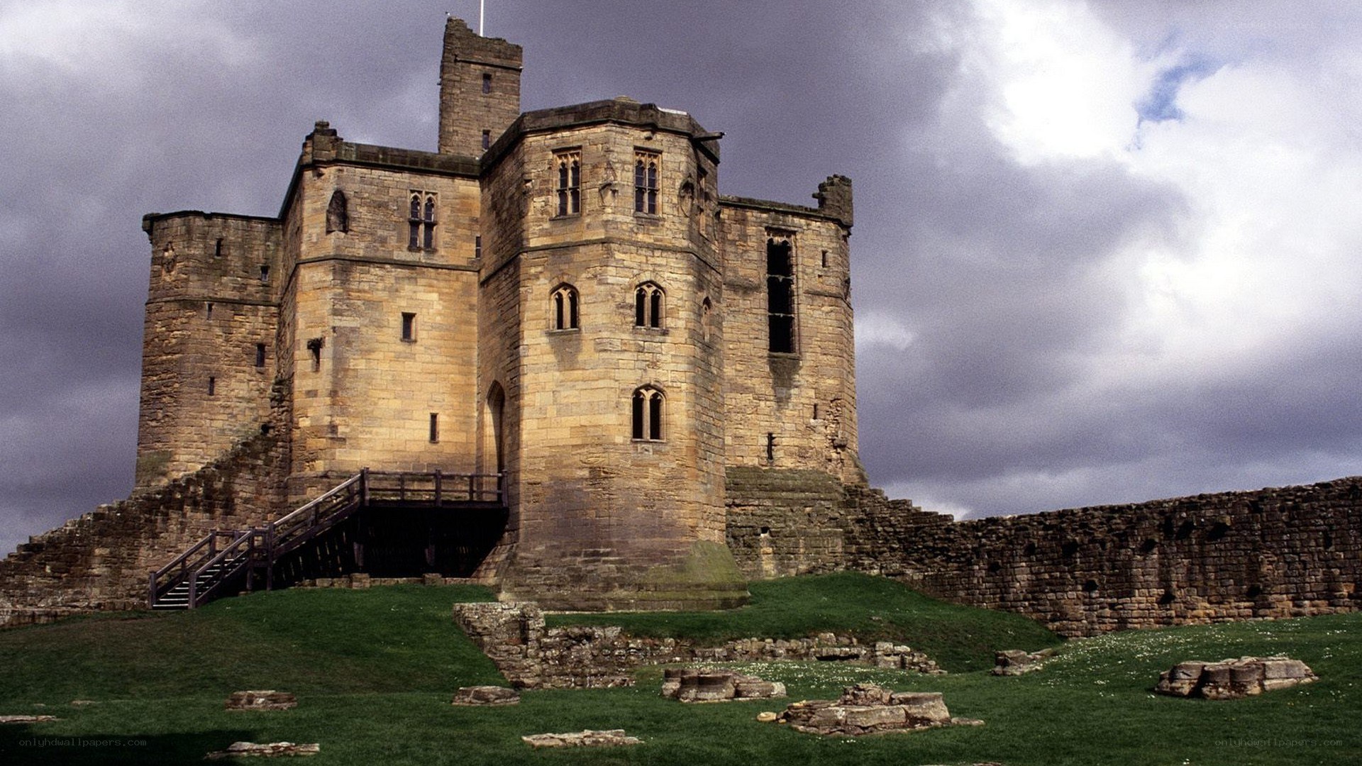 Bamburgh Castle under cloudy sky