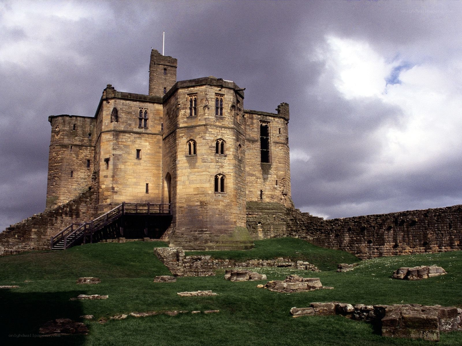 Bamburgh Castle under cloudy sky