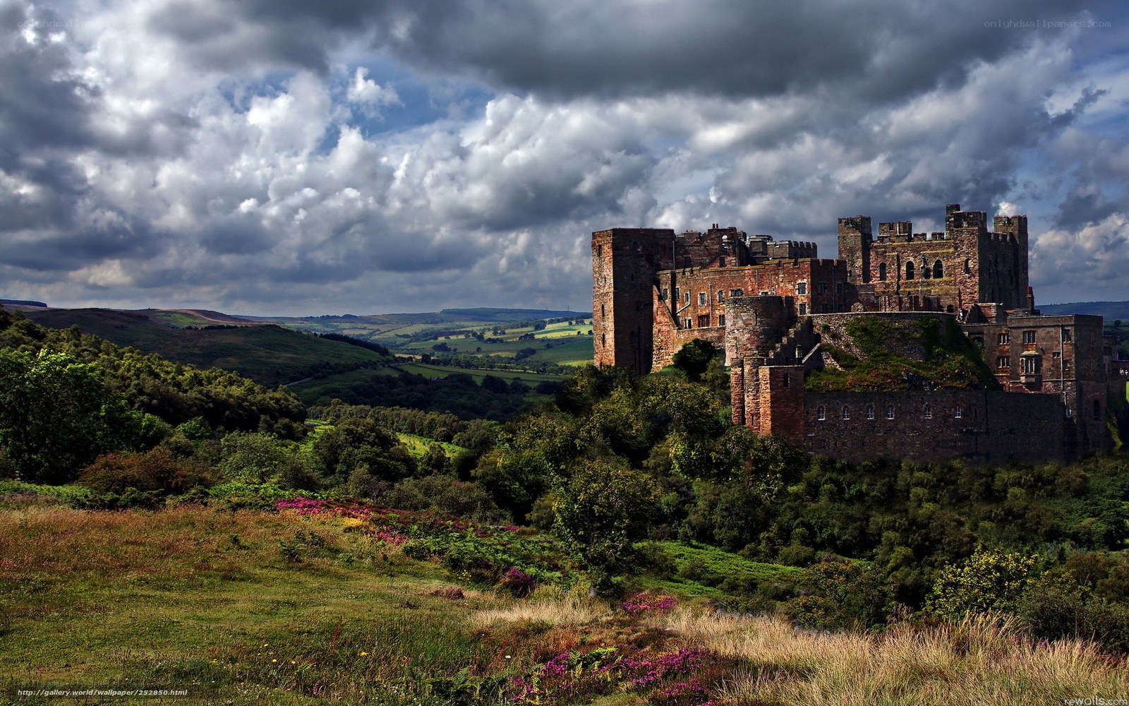 Bamburgh Castle under stormy sky