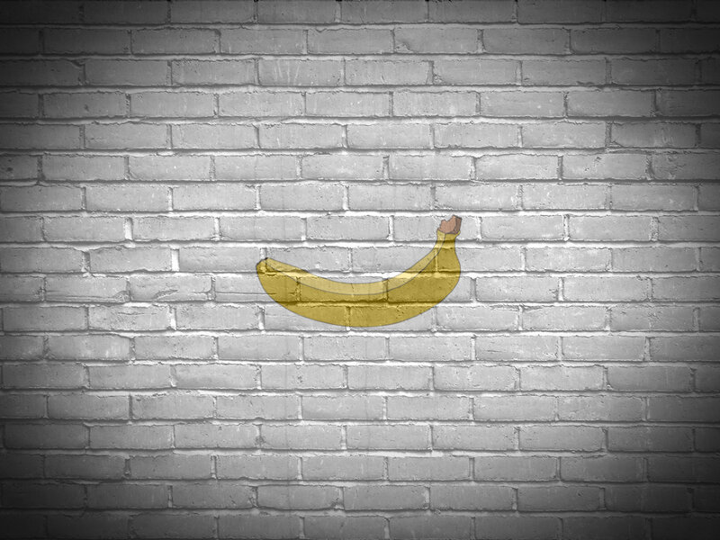banana on brick wall