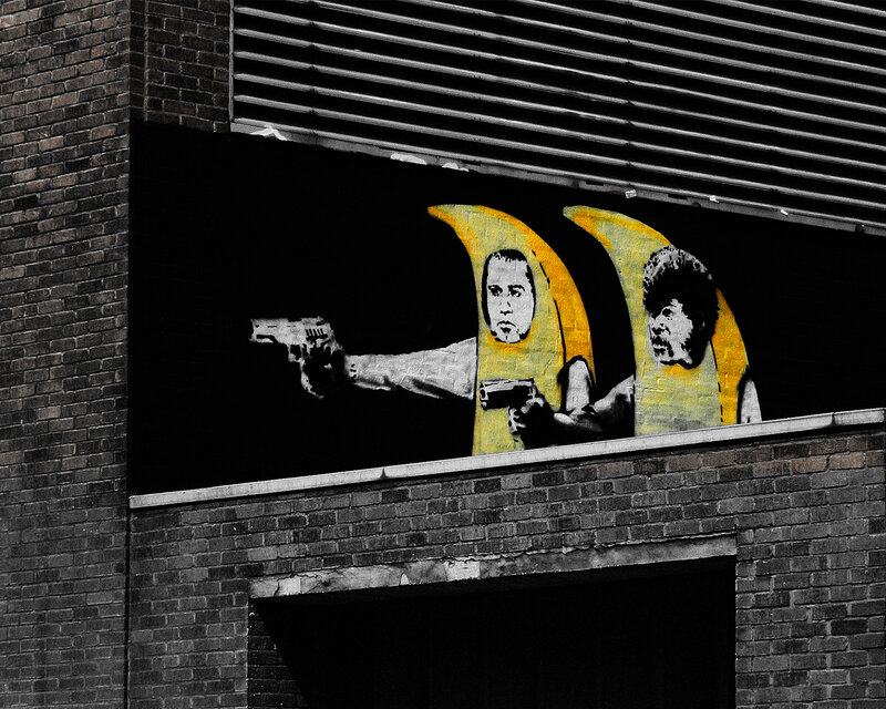 Banana-suited figures with guns