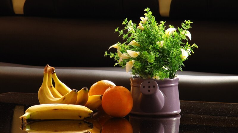 Bananas and Oranges on Table
