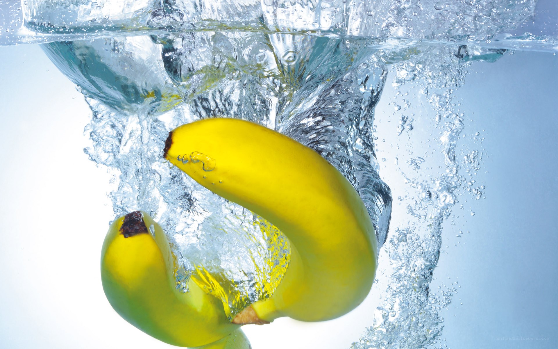 Bananas falling into water