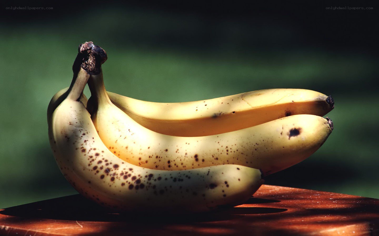 Bananas on a wooden surface