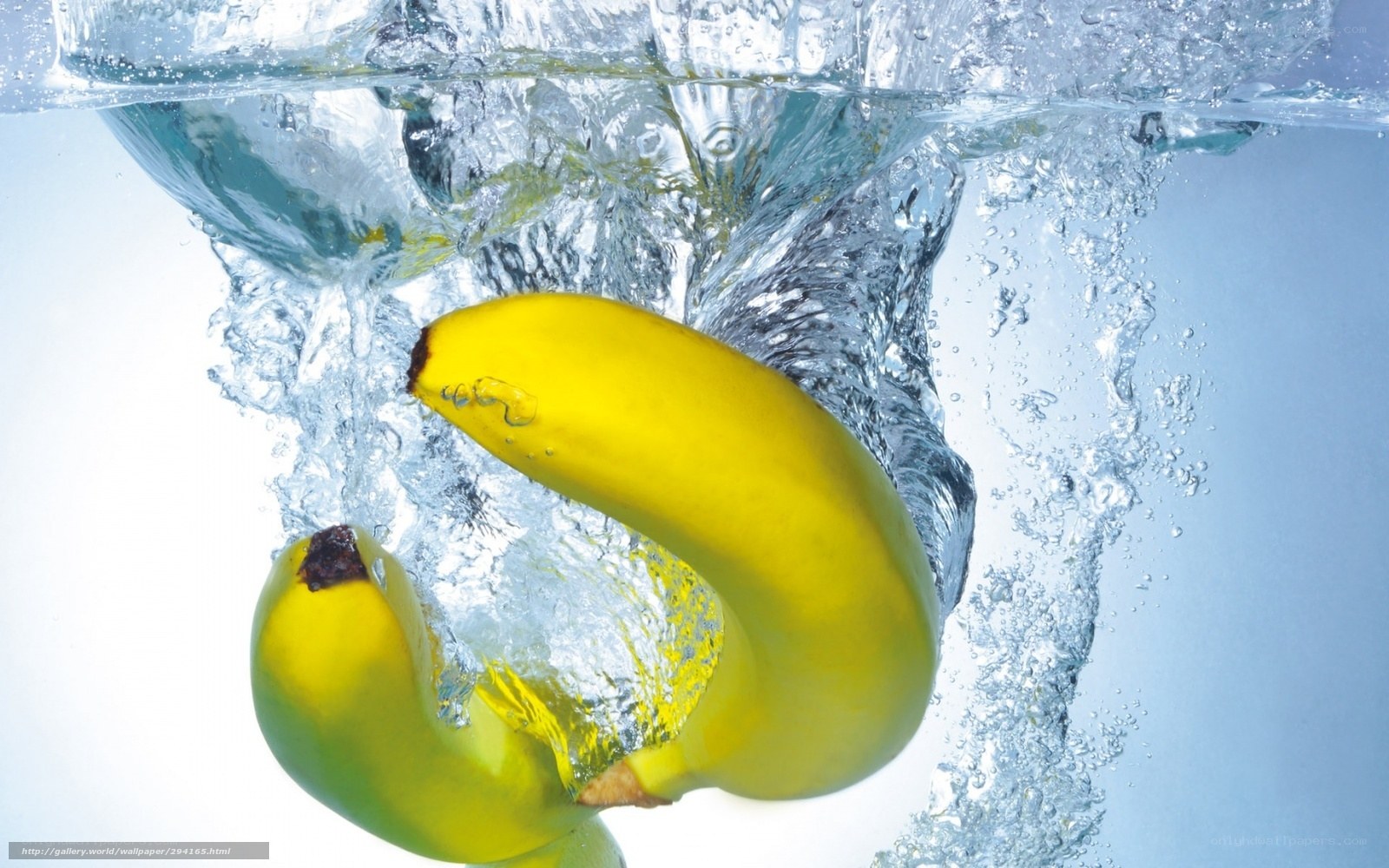 Bananas splashing in water