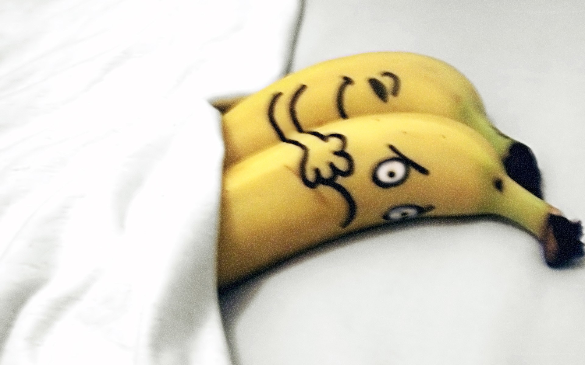 bananas with drawn faces