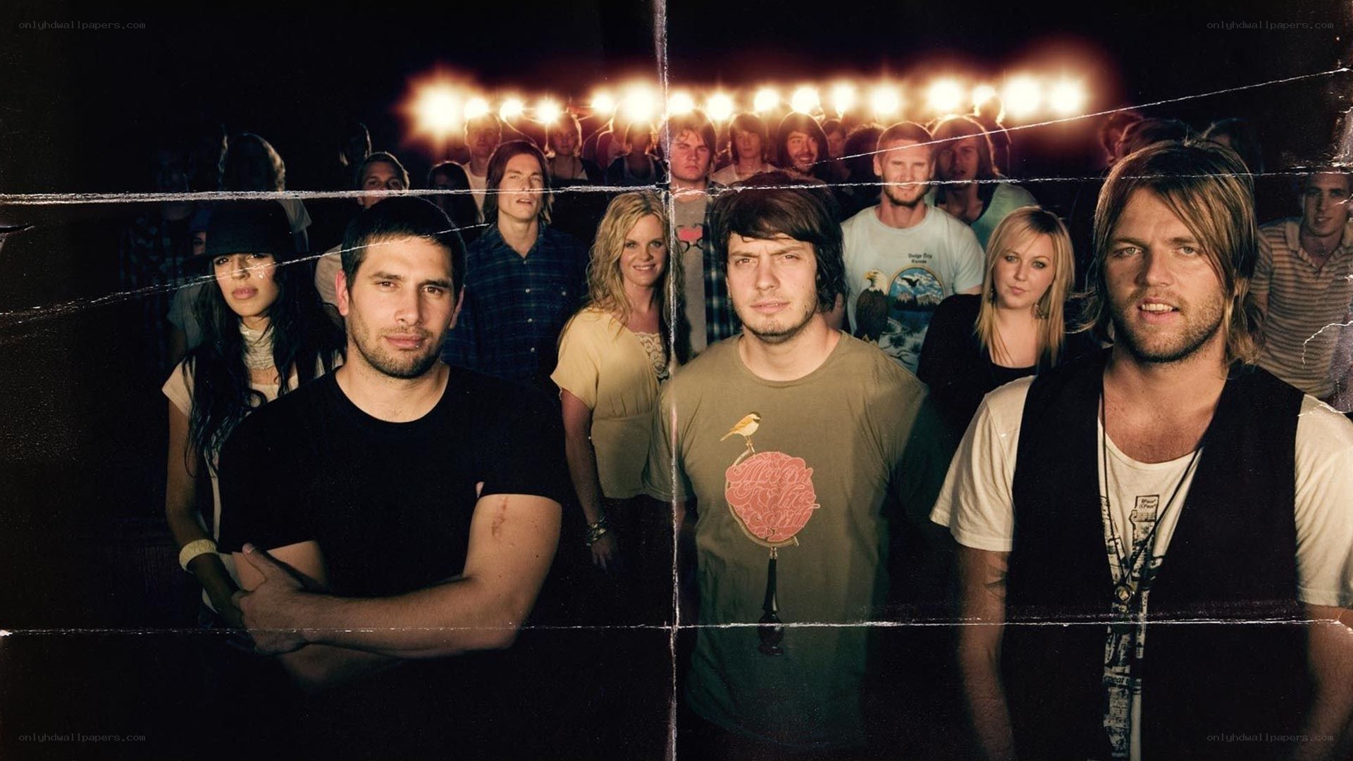 band at concert with crowd