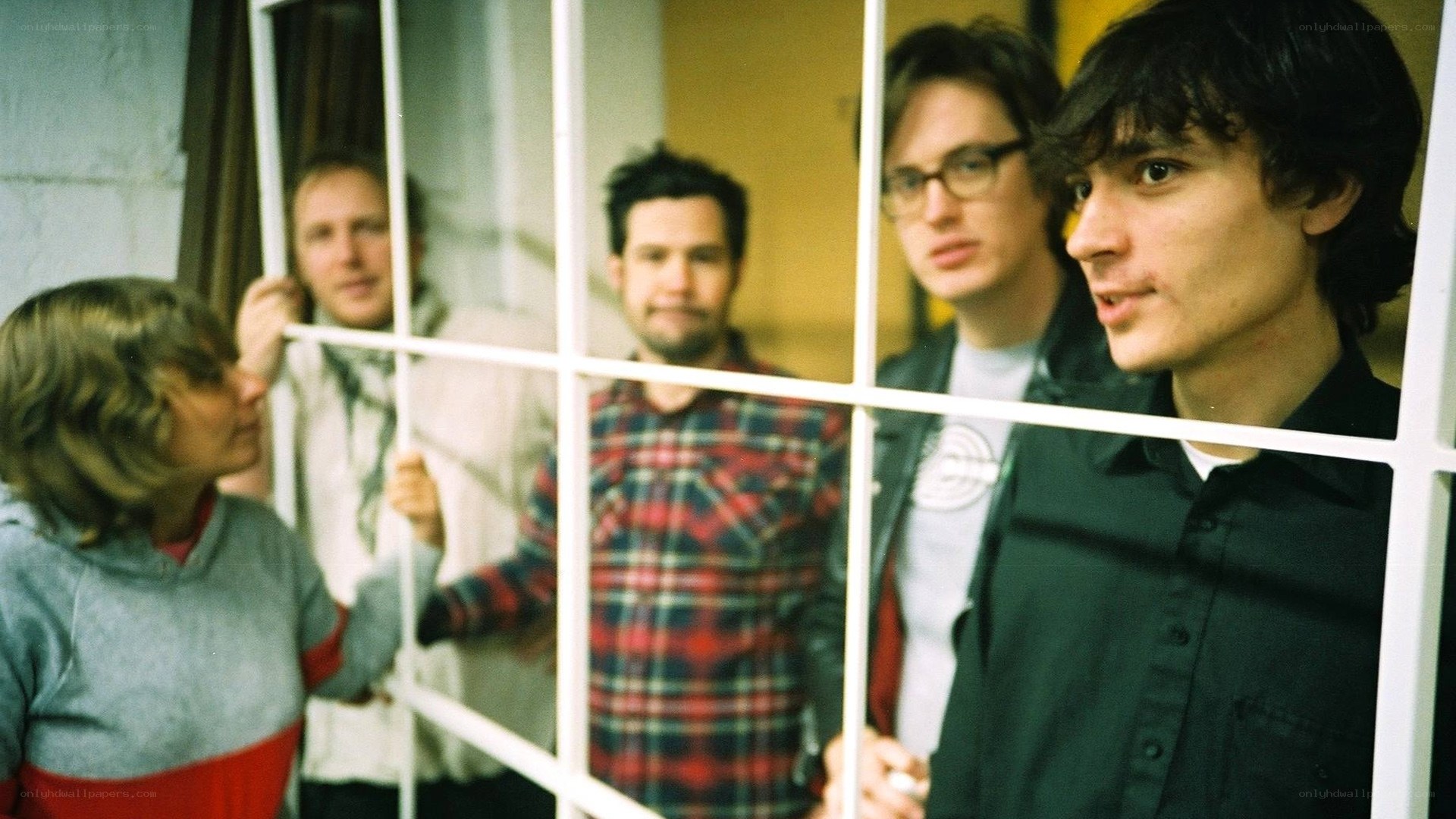 band behind a window
