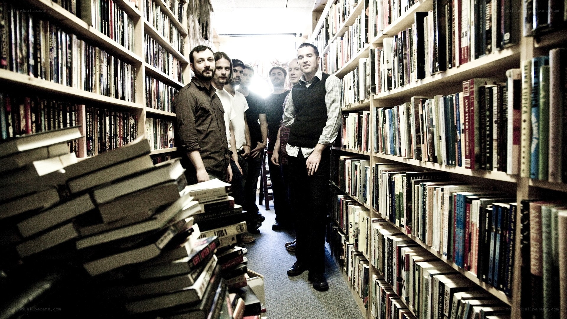 band in a bookstore aisle