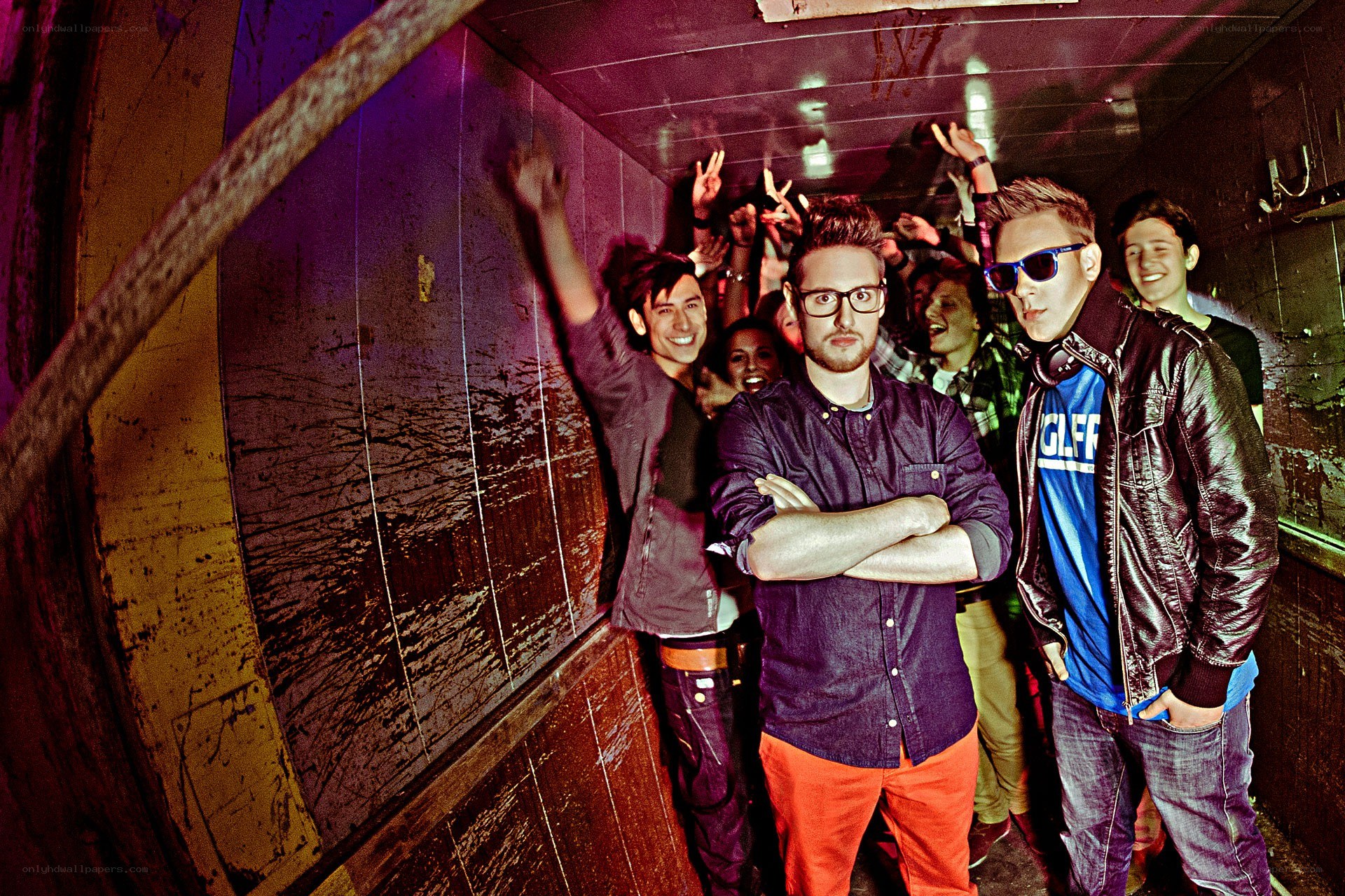 band in a dimly lit corridor