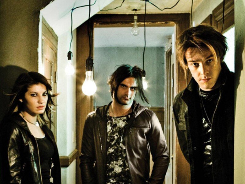 band in a dimly lit hallway