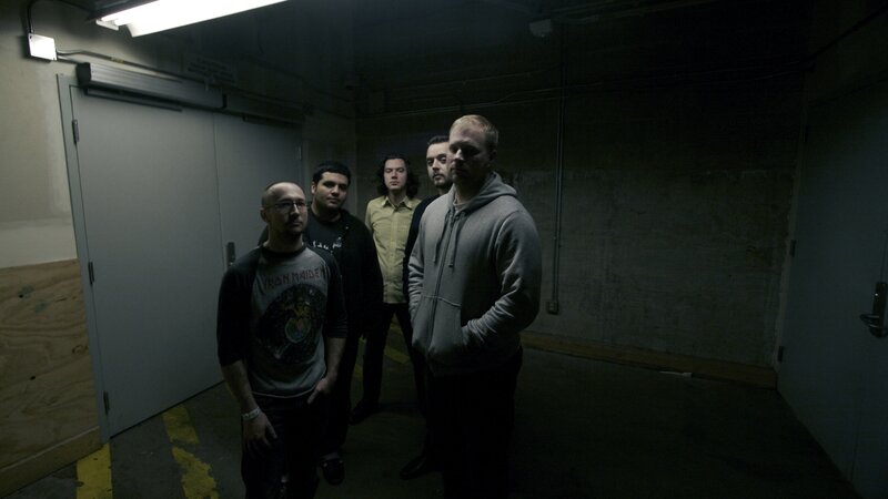 band in a dimly lit hallway