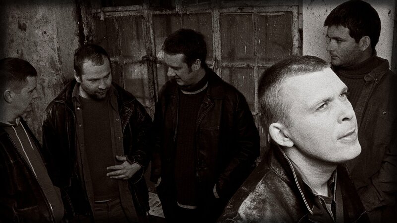 band in a dimly lit room