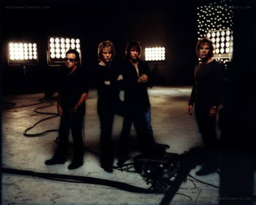 band in a studio with lights