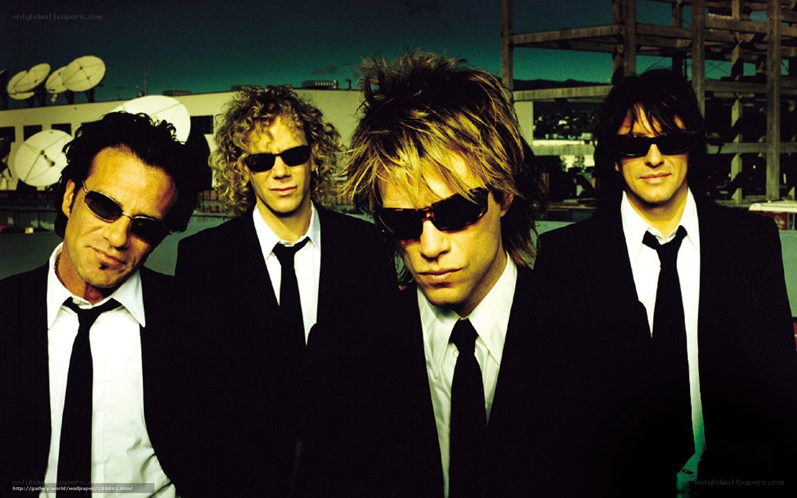 band in black suits and sunglasses