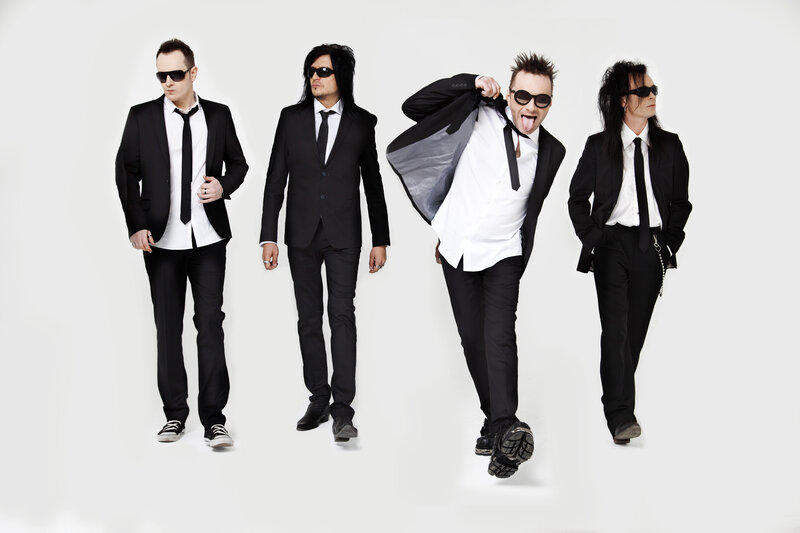 band in black suits
