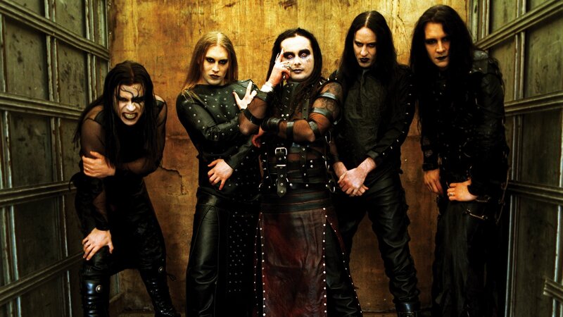 band in dark makeup and clothing