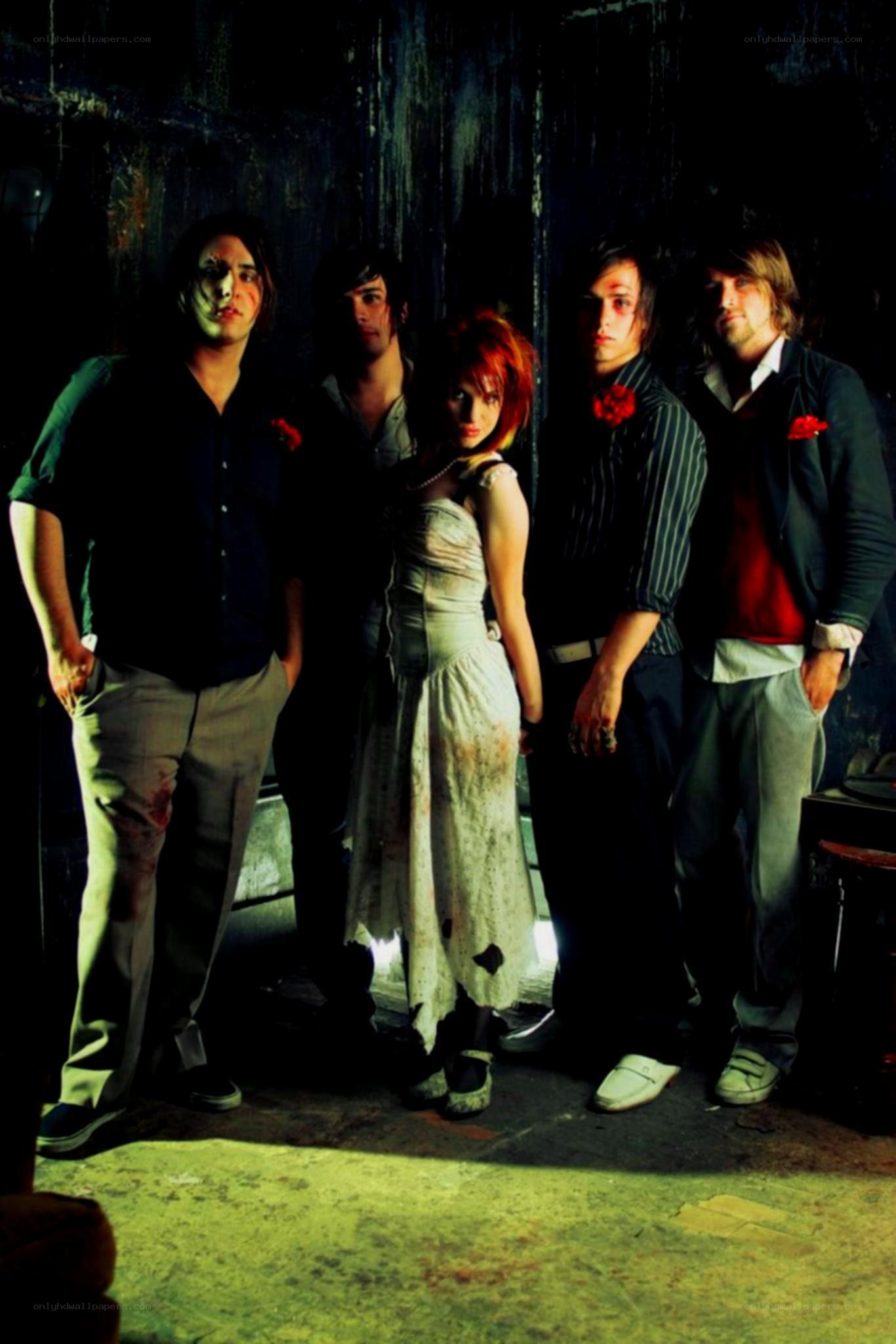 band in dark setting with blood effects