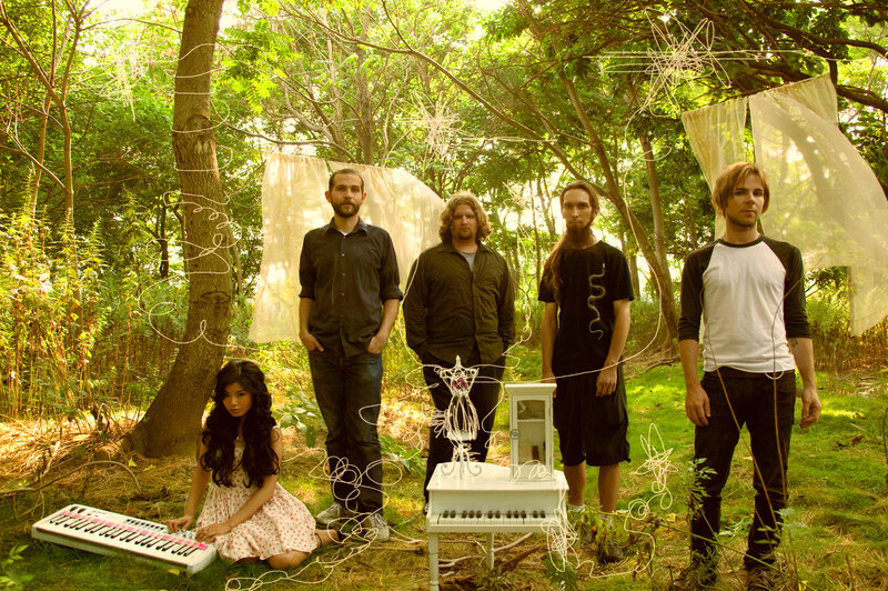 band in forest with instruments